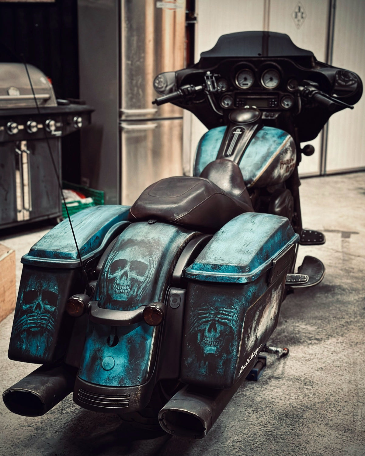 Hand-laid paint detail and patina on a custom motorcycle tank